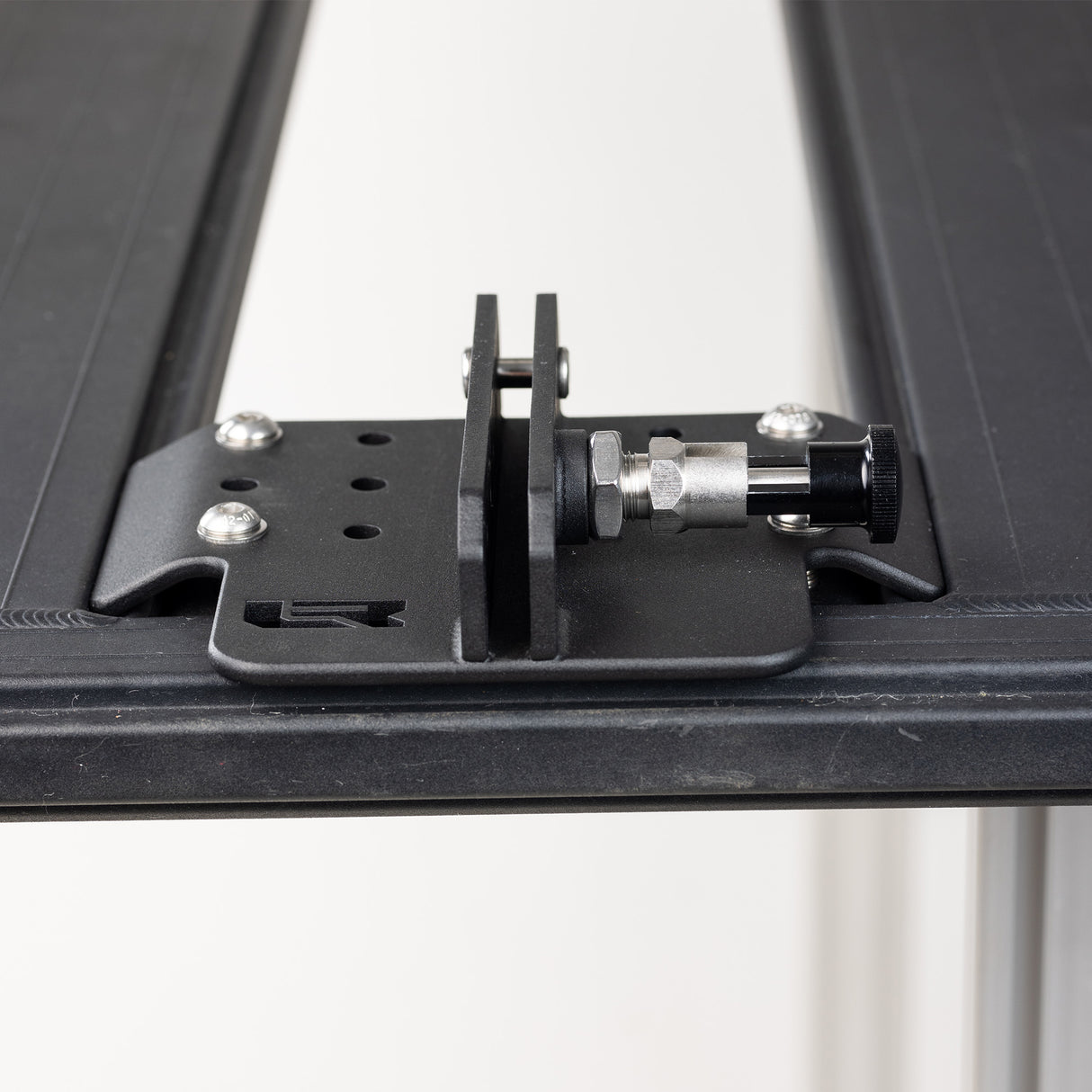 Close up of the three plate clamp on the ARB Base Rack rail